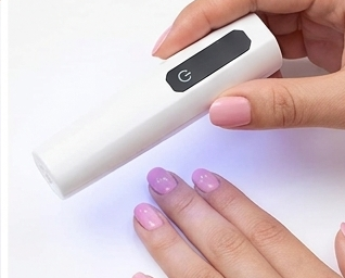 Step 3: cure the nails under the included UV lamp